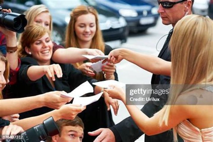 'Chunky me': Gwen Stefani posts flashback photos of herself getting an autograph from Sting