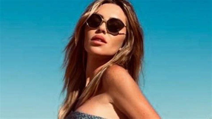 Abbey Clancy has legs for days in stylish bikini on romantic holiday