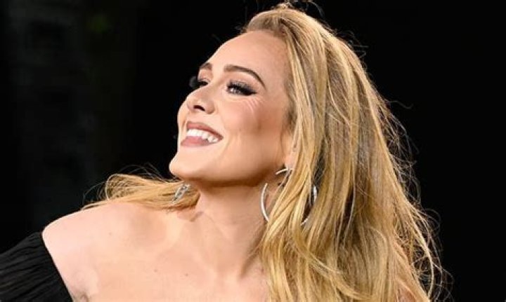 Adele turns heads in one seriously bold co-ord - and a stack of unreal jewels