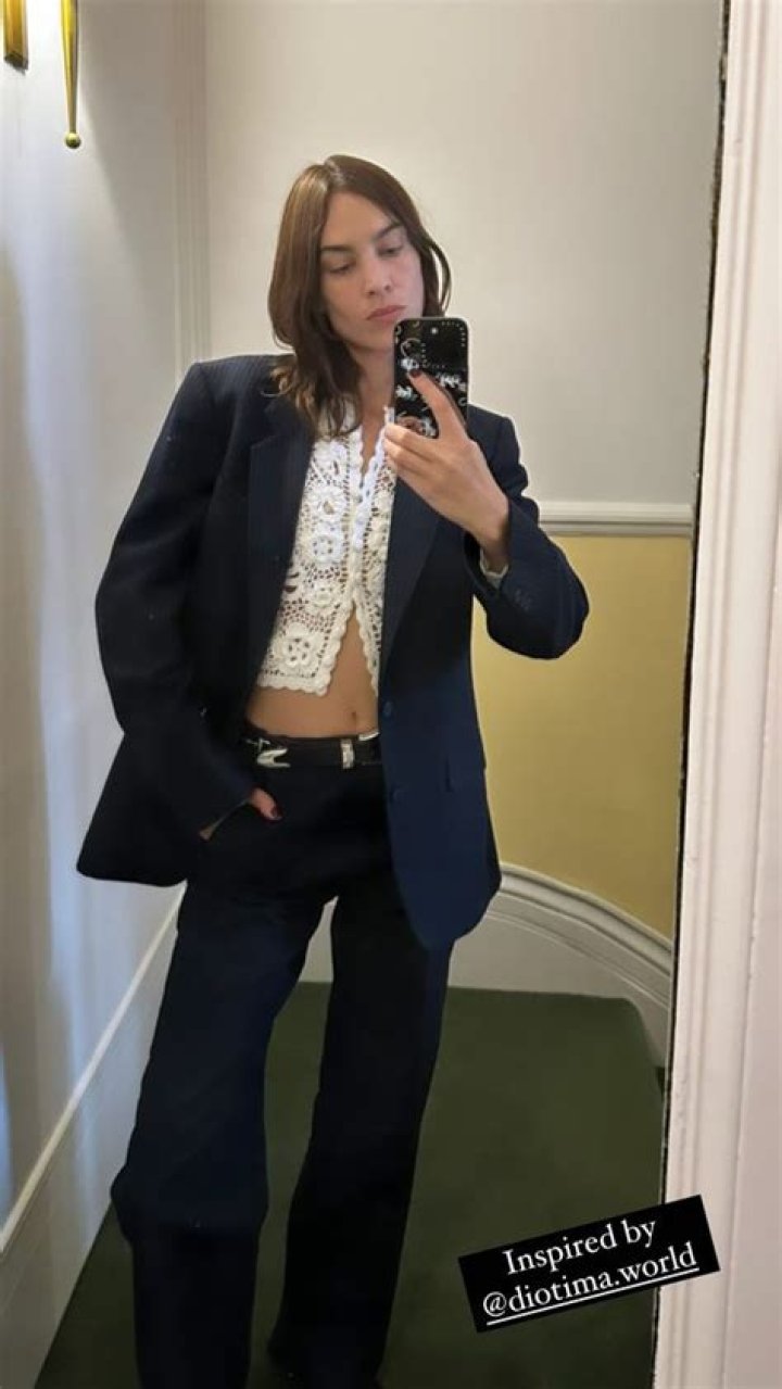 Alexa Chung styles pinstripes with the most unlikely top - see photos