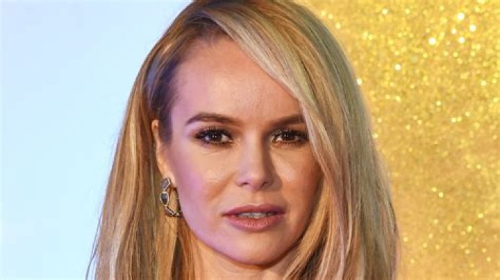 Amanda Holden shares emotional video with rare family photos