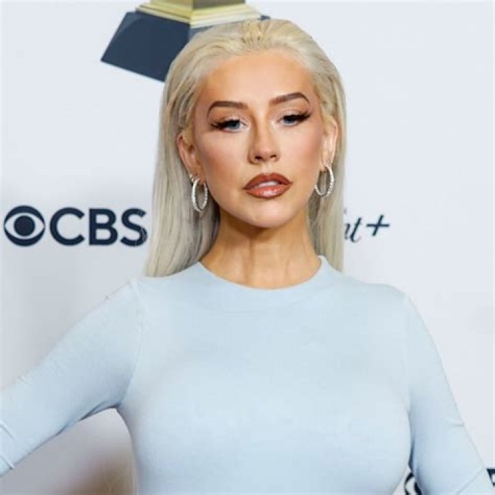 Christina Aguilera shows off svelte new look in ice blue dress that might surprise you