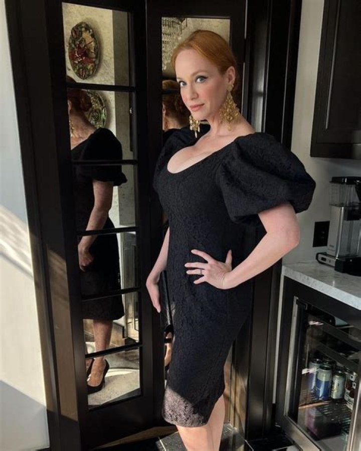 Christina Hendricks' hourglass curves have fans doing a double take in tight black dress
