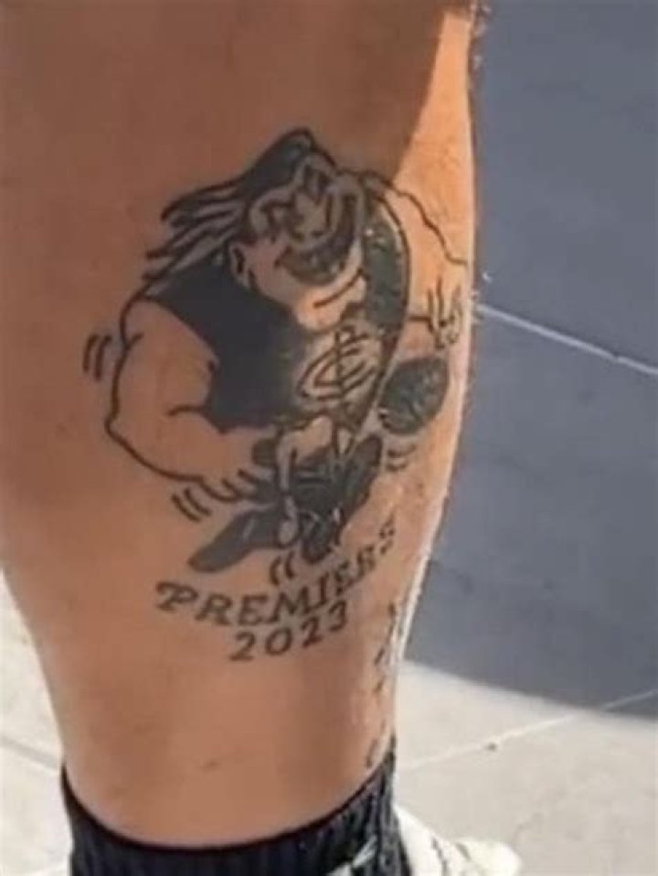 Collingwood fan’s awkward tattoo fail after Premiership win