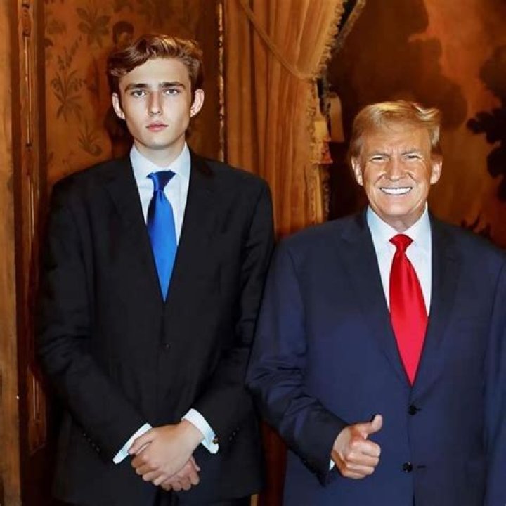 Donald Trump's son, Barron, 18, displays towering 6ft 7 physique in photo as he dwarfs lookalike dad