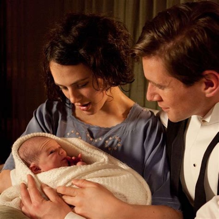 Downton Abbey's Jessica Brown Findlay shares baby bump photo - see Hugh Bonneville's sweet reaction