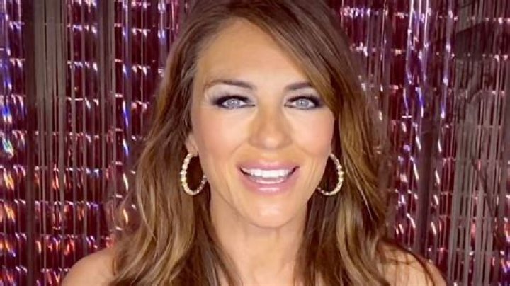 Elizabeth Hurley dazzles in satin gown with thigh-high slit as she shares rare glimpse inside home bar