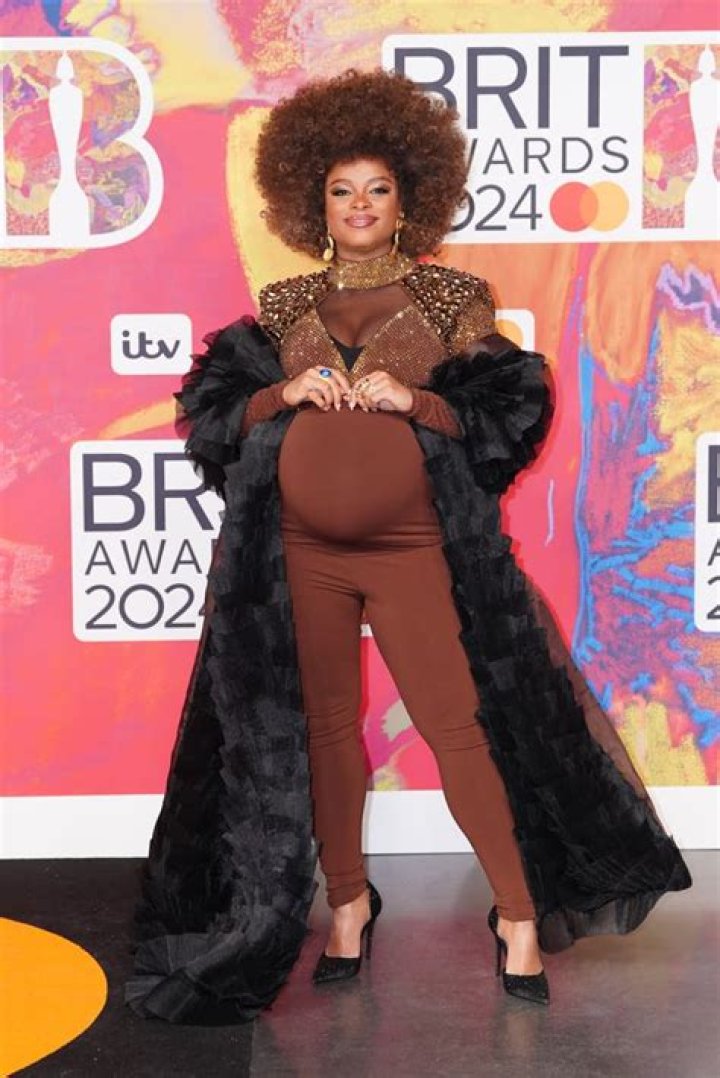 Fleur East debuts baby bump in bejewelled catsuit - and Strictly's Vito Coppola has the BEST reaction