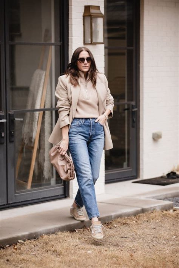 Frankie Bridge lights up the room in neon blazer and jeans