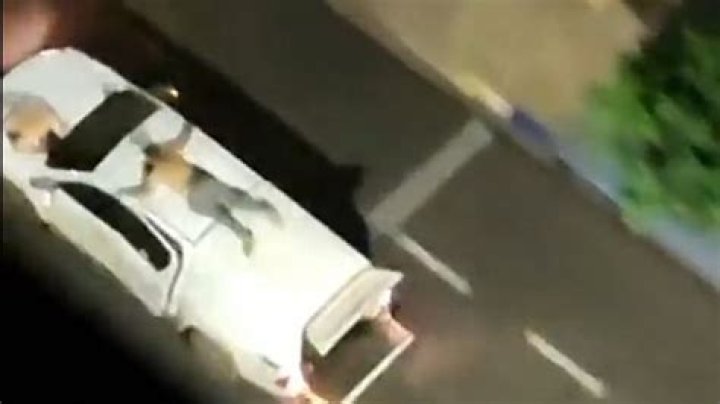 Hostages used as human shields on top of cars in Brazil bank robbery (photos/video)