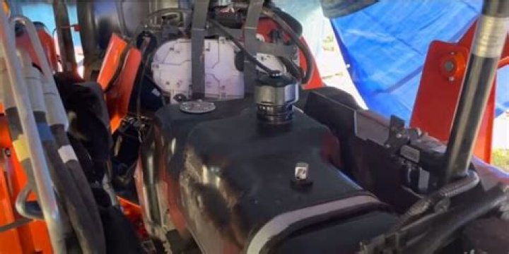 how to clean a diesel fuel tank on a tractor?