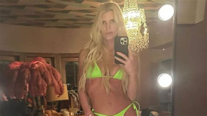 Jessica Simpson wows in cut-out swimsuit by the beach following candid confession about her weight loss