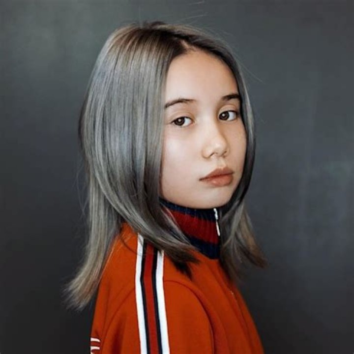 Lil Tay, 14-year-old whose death was hoaxed, returns with music video, shocking accusations