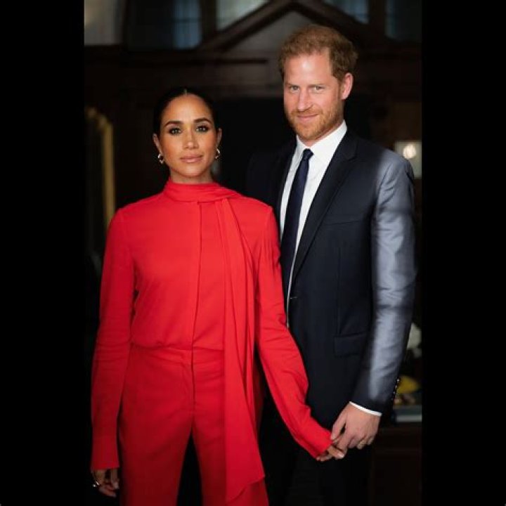 Meghan Markle forced to miss Prince Harry's award ceremony as one of their children 'became unwell'