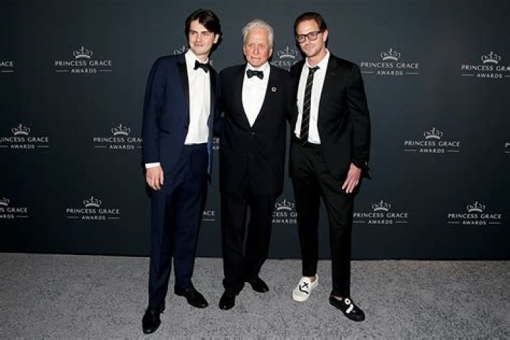 Michael Douglas' son Dylan is identical to famous dad in poolside photos - unfortunate side effect from shoot revealed