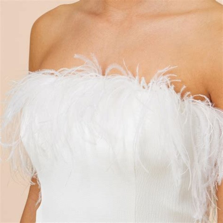 Millie Bobby Brown’s strapless feather dress is perfect for winter brides