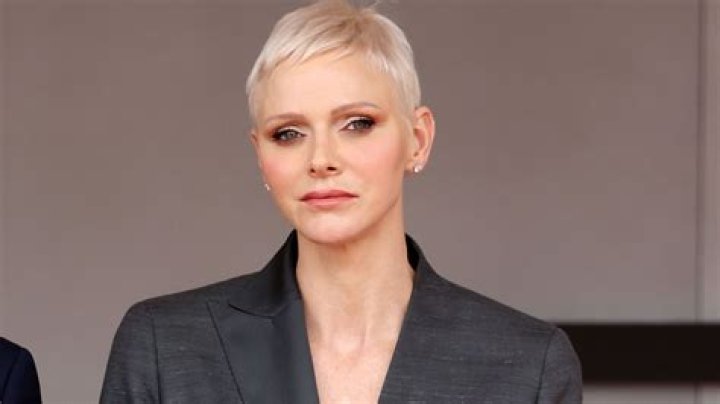 Princess Charlene rocks silk power suit and fans have thoughts