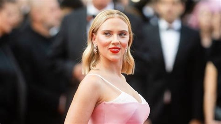 Scarlet Johansson exposes her back tattoo in peek-a-boo bra