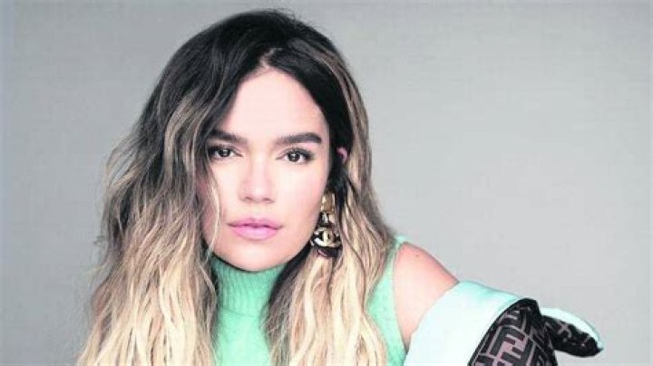 Singer, Karol G suffers embarrassing fall on stage while performing in Miami (video)