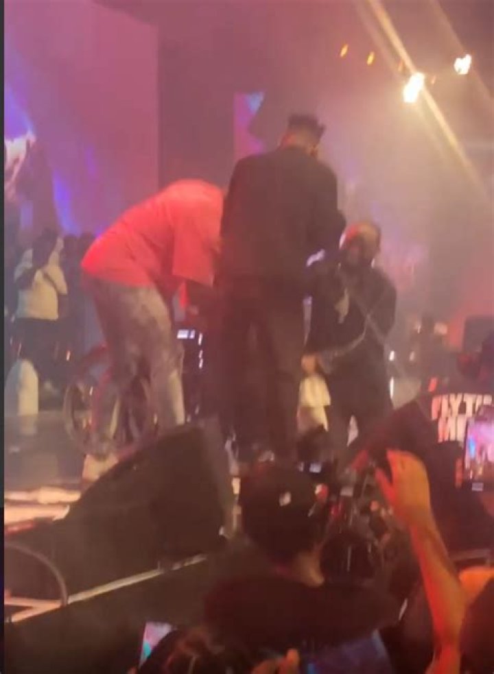 Singer Victony cheered by fans as he stands to perform for the first time since accident that confined him to a wheelchair (video)