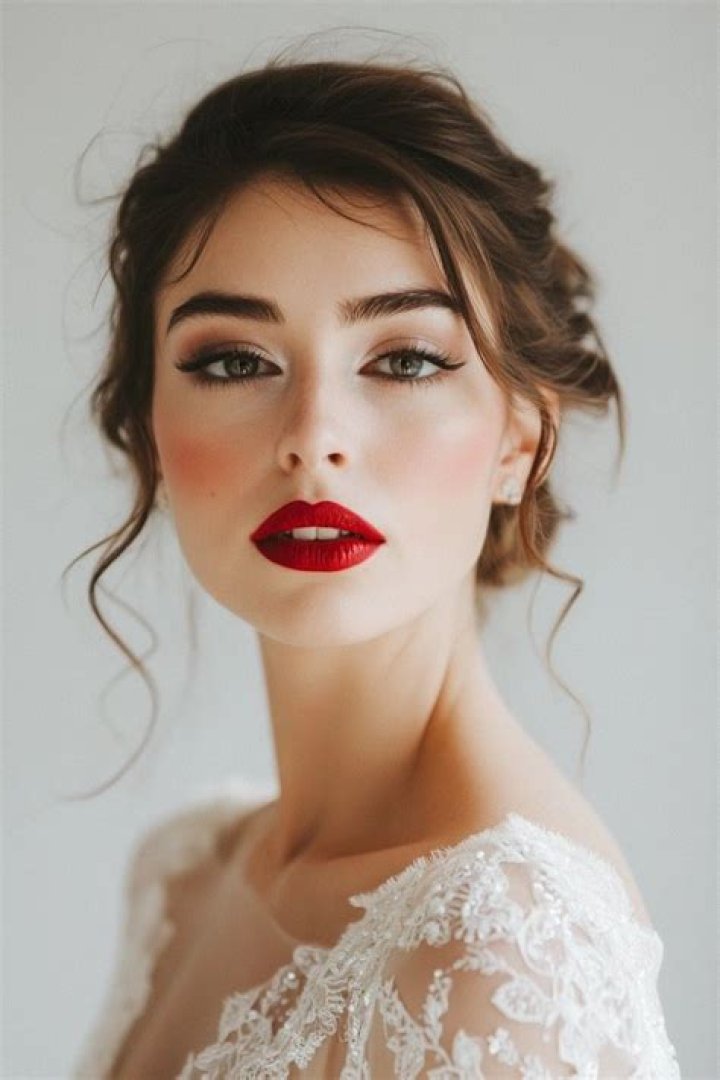 Someone has recreated Meghan Markle's wedding day makeup with red lipstick and smokey eyes